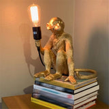 Syham 26.7" Golden Desk Lamp Set with Outlet